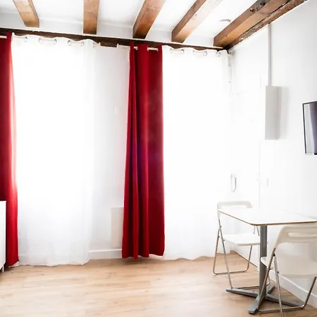 Апартаменты Le 64 Rue Chapon
